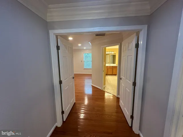 a large bathroom with a large tub and sink