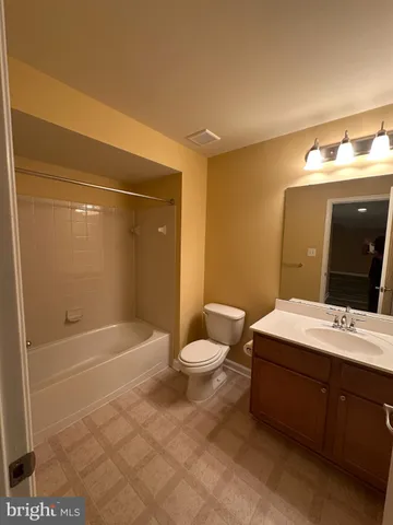 a view of a backyard with a small cabin