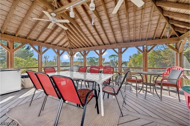 a view of a chairs and table in the patio