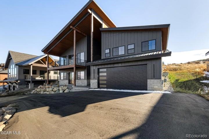 634 Lower Ranch View Road Granby, CO 80446 - Photo 19 of 50 a front view of a house with a yard