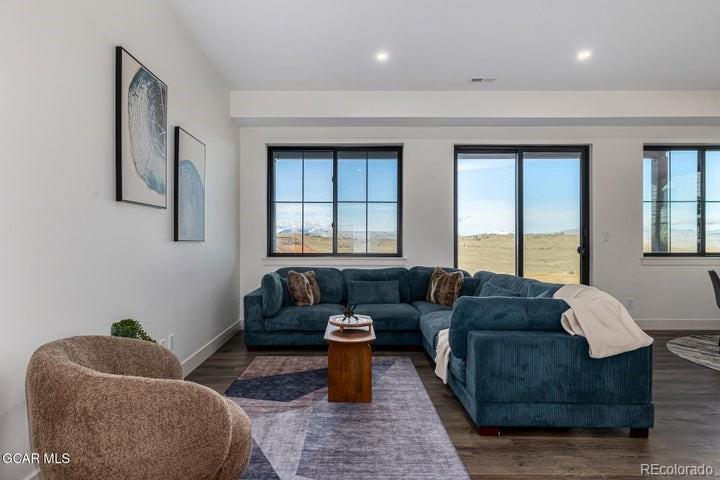 634 Lower Ranch View Road Granby, CO 80446 - Photo 25 of 50 a living room with furniture and a window