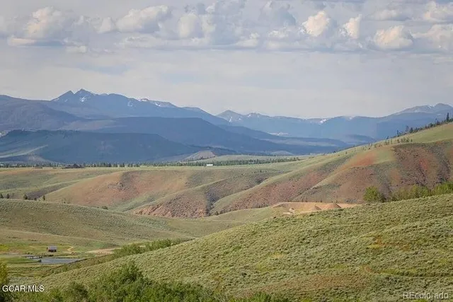 a view of a ocean with beach