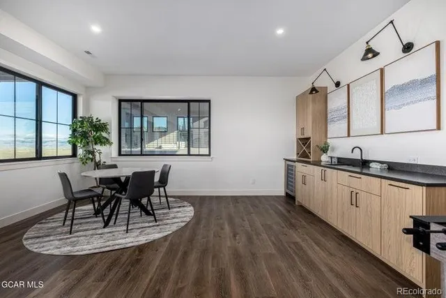 a bathroom with a toilet a sink and bathtub
