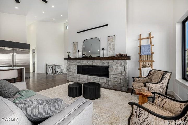 634 Lower Ranch View Road Granby, CO 80446 - Photo 35 of 50 a living room with furniture and a fireplace