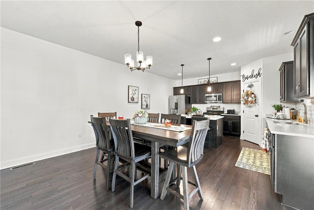 1064 Lux Road Jeannette, PA 15644 - Photo 9 of 43 Open concept into dining room