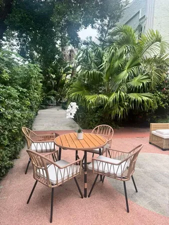 a living room with furniture window and wooden floor