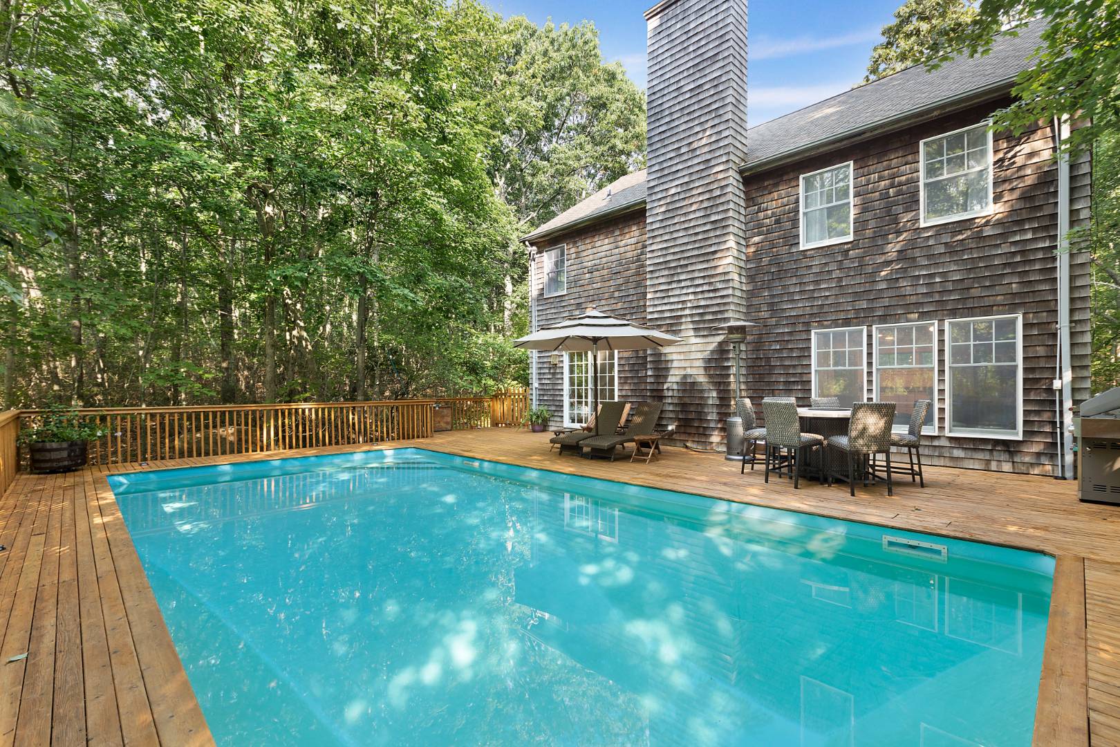 25 Old Sag Harbor Road Bridgehampton, NY 11963 - Photo 2 of 19 a view of a house with backyard and sitting area