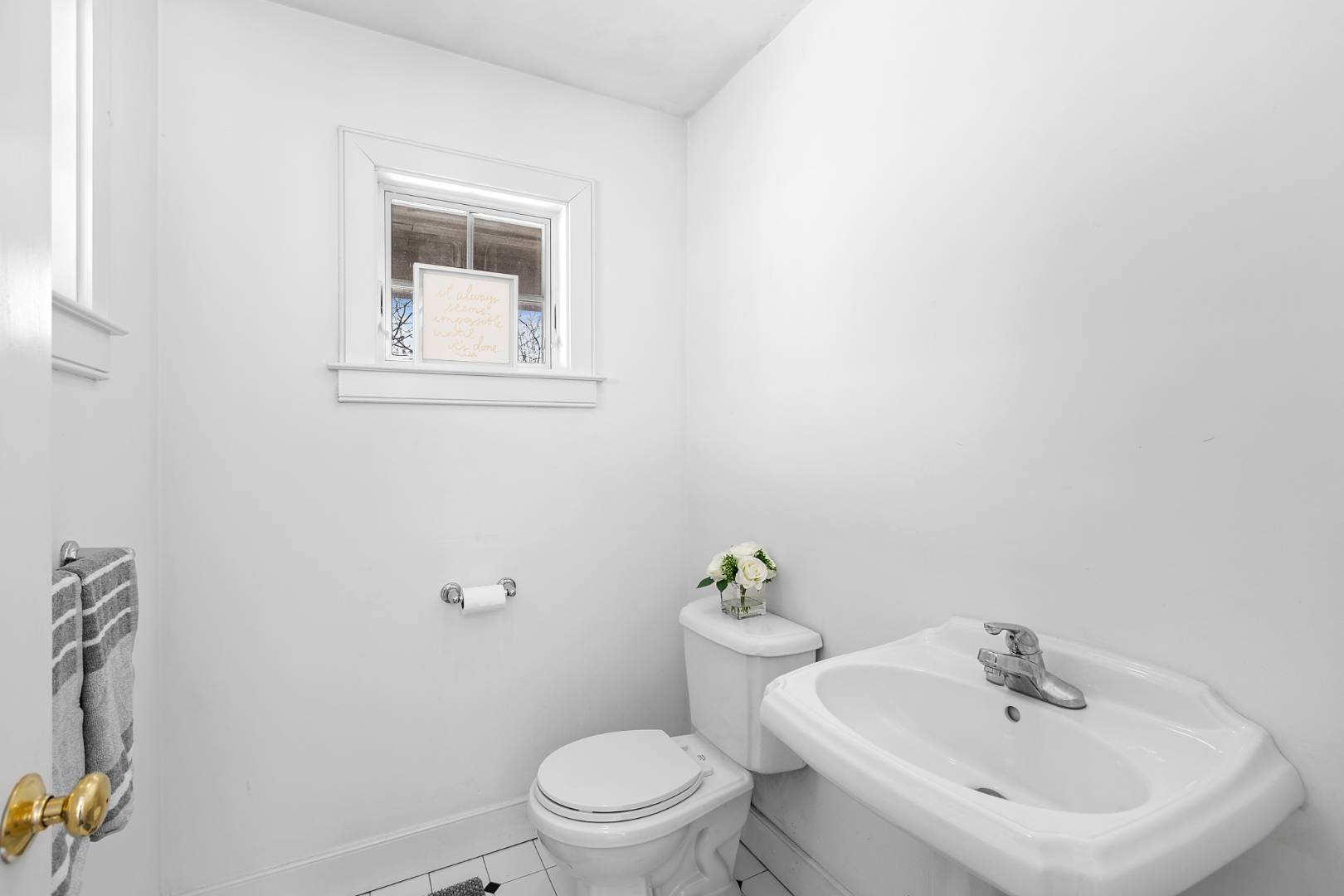 25 Old Sag Harbor Road Bridgehampton, NY 11963 - Photo 11 of 19 a bathroom with a sink mirror and toilet