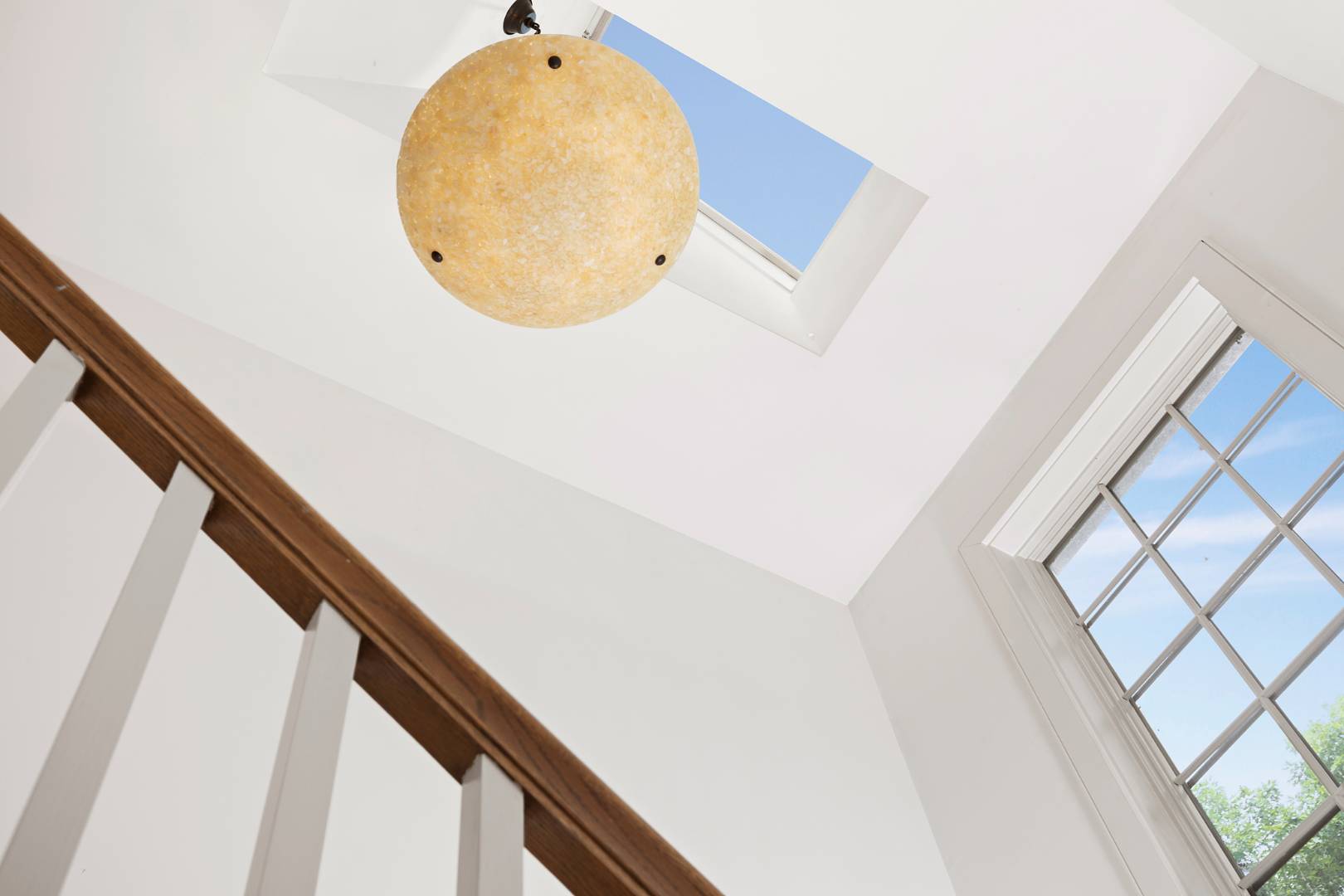 25 Old Sag Harbor Road Bridgehampton, NY 11963 - Photo 12 of 19 a view of staircase with wooden floor and door