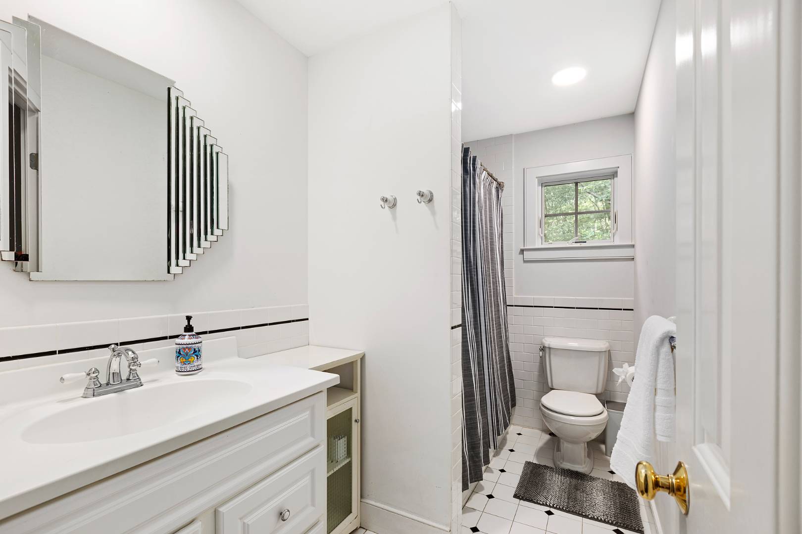 25 Old Sag Harbor Road Bridgehampton, NY 11963 - Photo 18 of 19 a bathroom with a sink toilet and shower