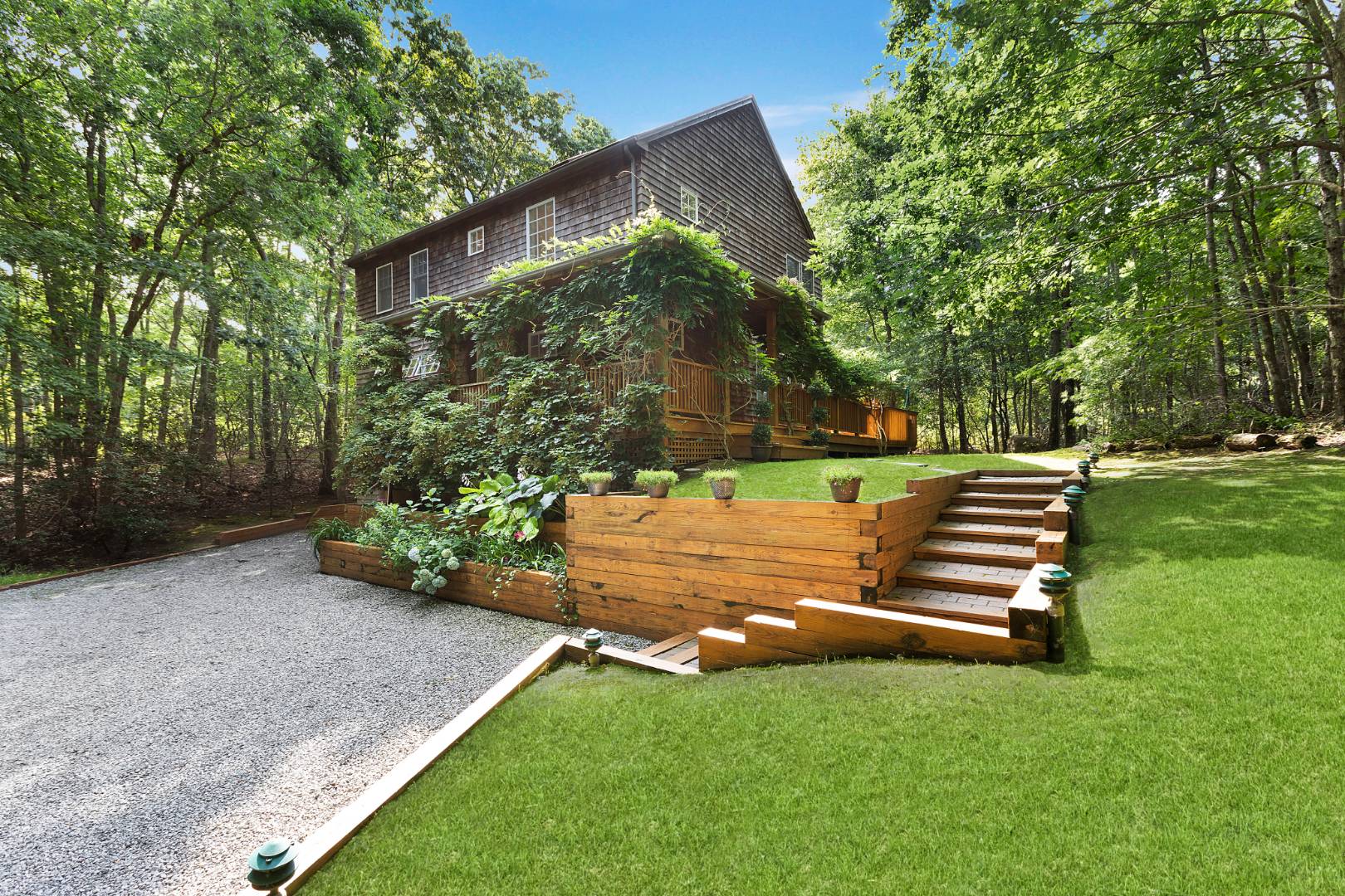 25 Old Sag Harbor Road Bridgehampton, NY 11963 - Photo 4 of 19 a view of a park with large trees