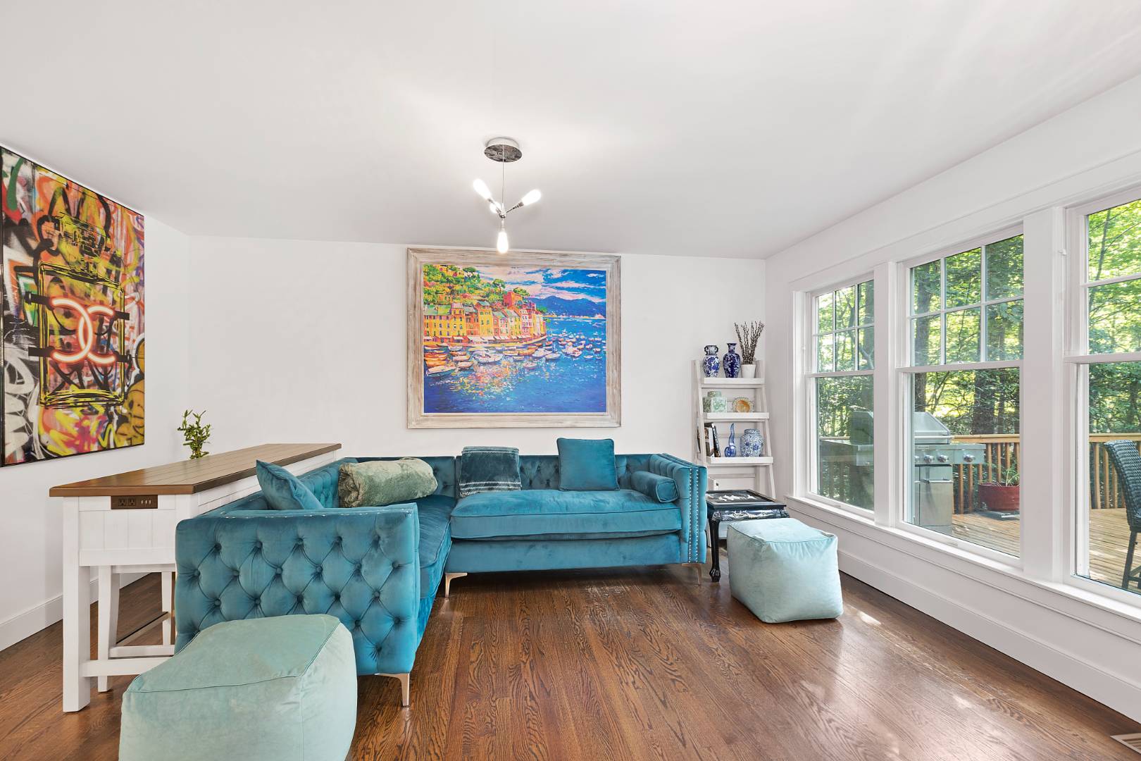25 Old Sag Harbor Road Bridgehampton, NY 11963 - Photo 9 of 19 a living room with furniture and a large window