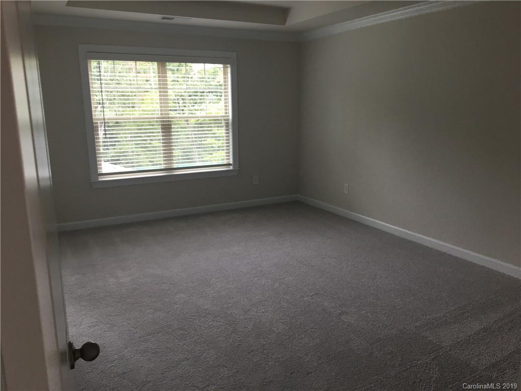 17535 Shearer Road Davidson, NC 28036 - Photo 12 of 22 an empty room with a window