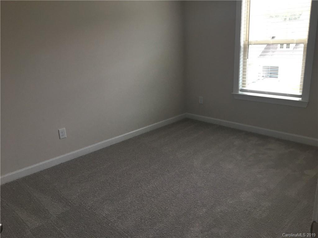 17535 Shearer Road Davidson, NC 28036 - Photo 17 of 22 an empty room with a window