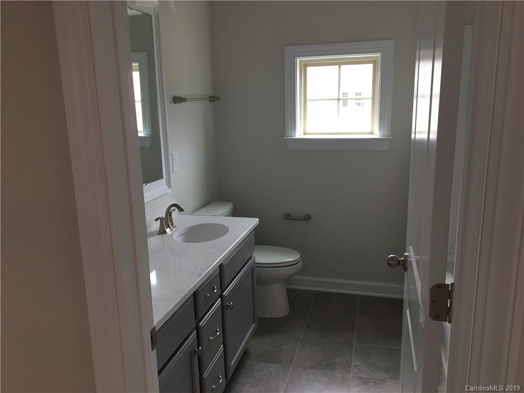 17535 Shearer Road Davidson, NC 28036 - Photo 19 of 22 a bathroom with a sink toilet and vanity