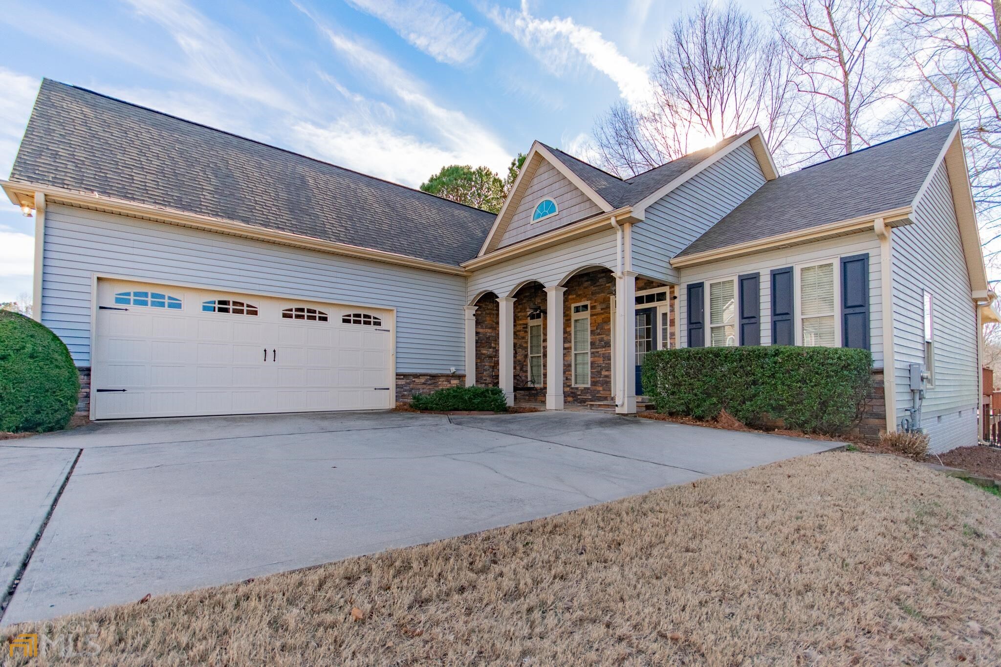 46 Greenview Drive Newnan, GA 30265 - Photo 1 of 1 a view of a white house with a large space in front of it