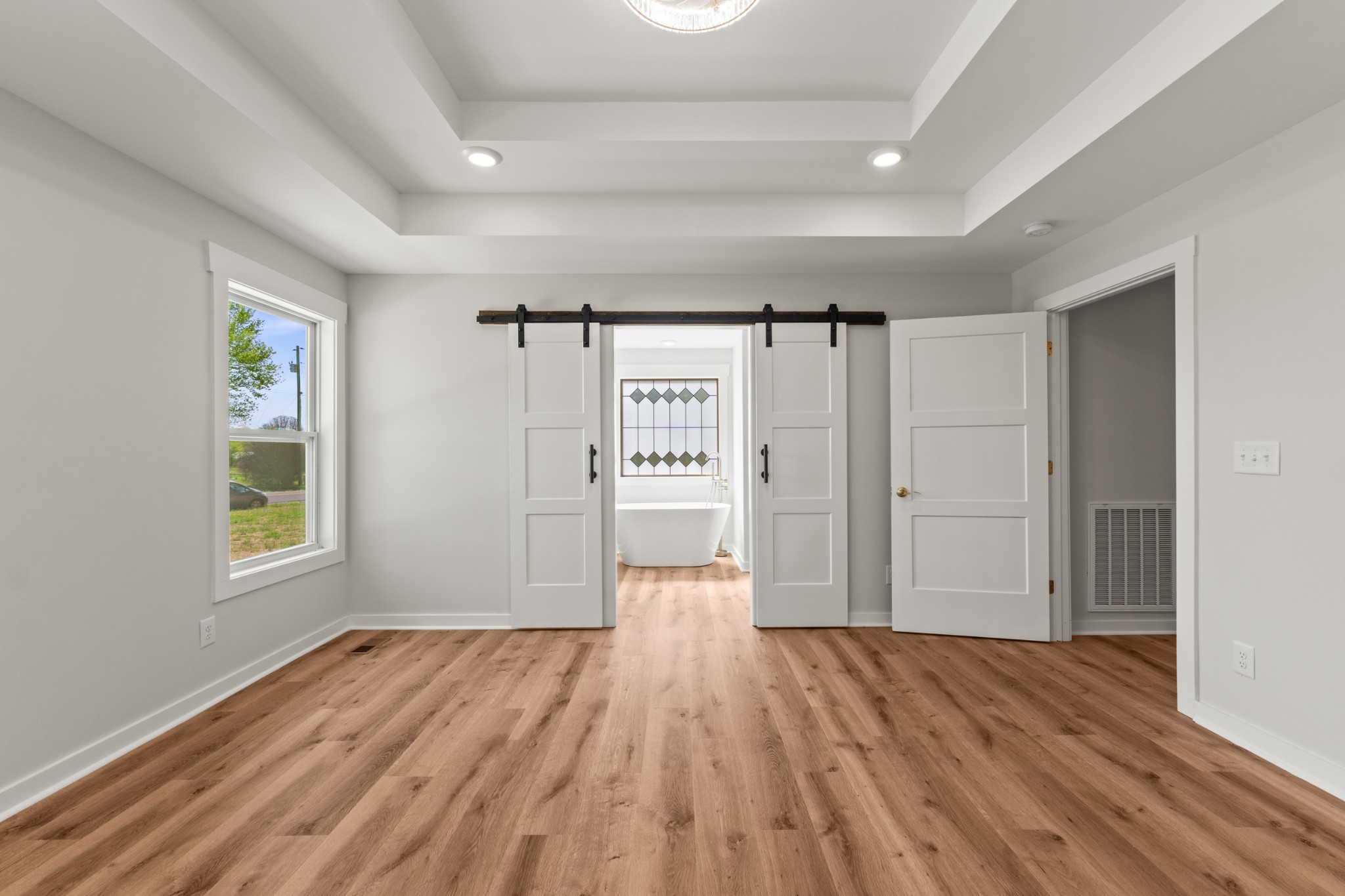 259 Patrick Road Fayetteville, TN 37334 - Photo 14 of 34 wooden floor in an empty room with a window