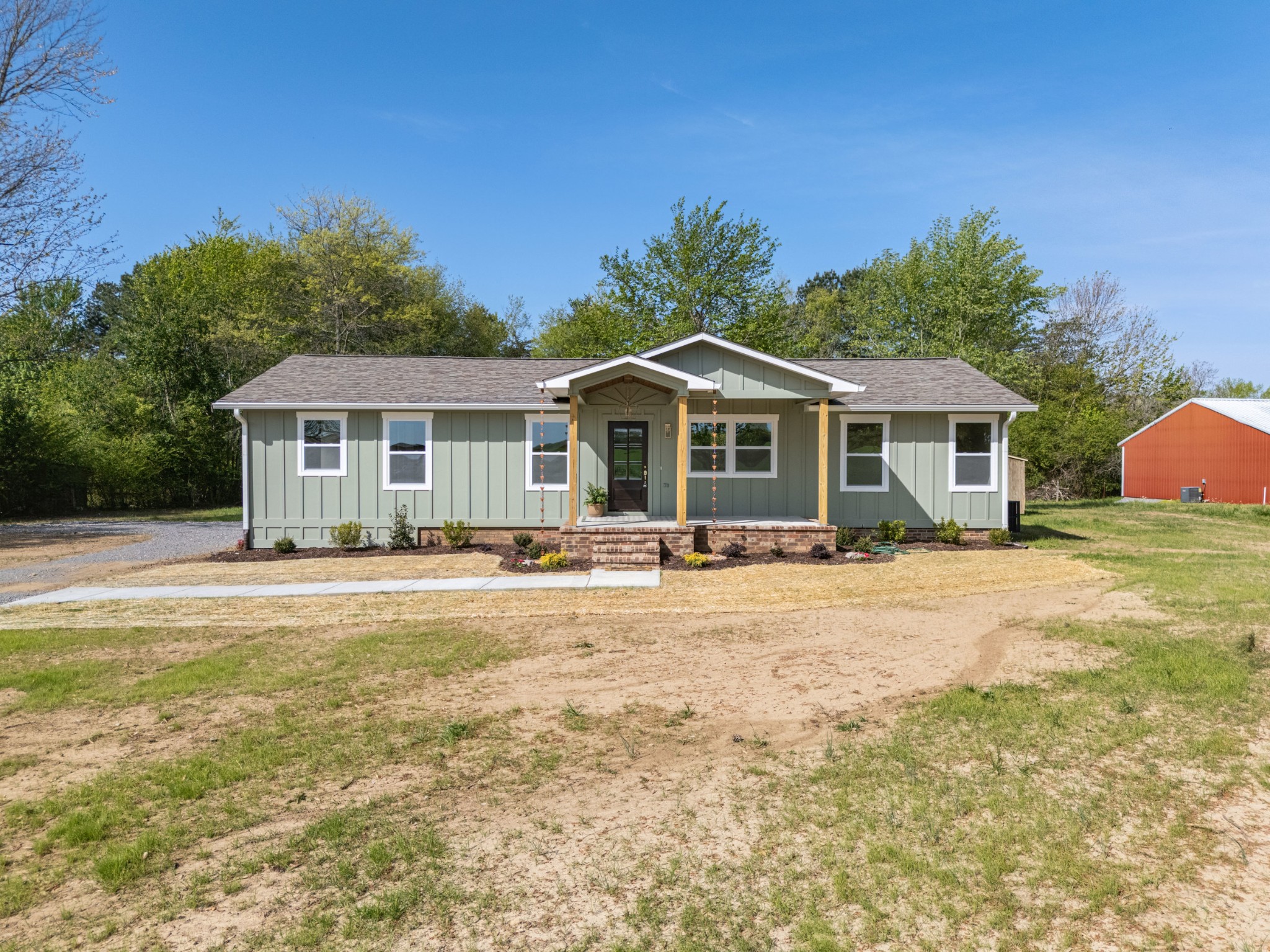 259 Patrick Road Fayetteville, TN 37334 - Photo 2 of 34 a front view of a house with a patio