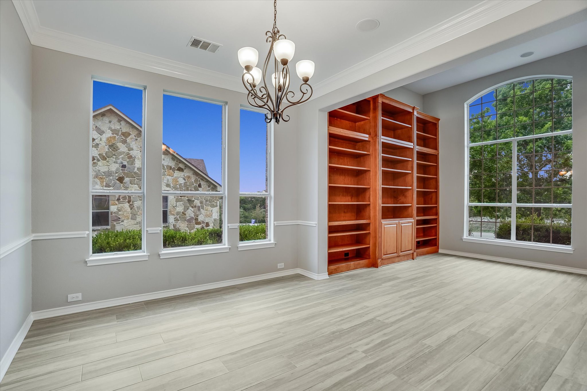1400 Tom Sawyer Road Austin, TX 78737 - Photo 9 of 40 Flexible dining area with updated flooring and open flow toward the main living spaces.