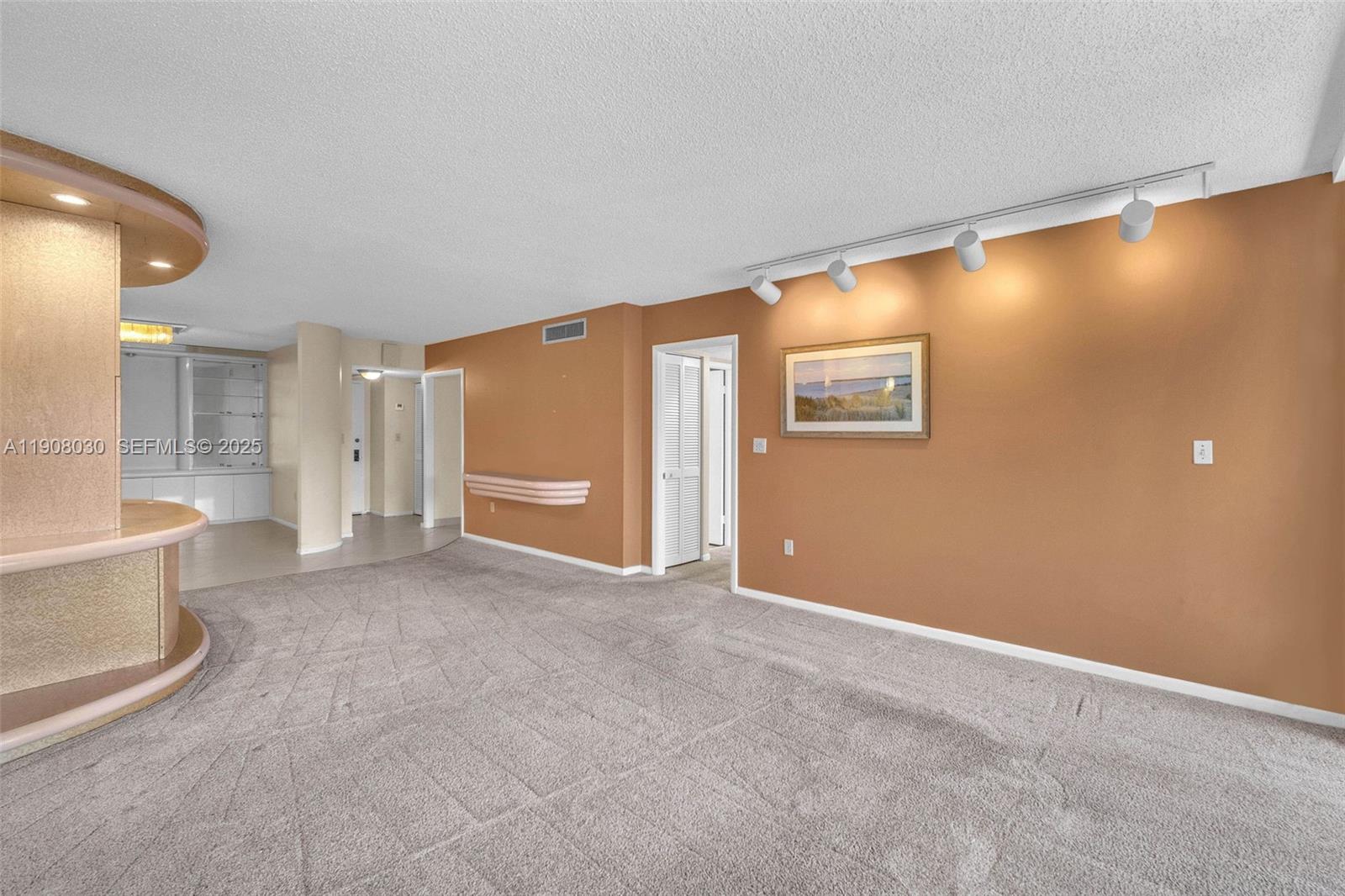 2810 North 46th Avenue, Unit F655 Hollywood, FL 33021 - Photo 19 of 52 a view of an empty room with a window