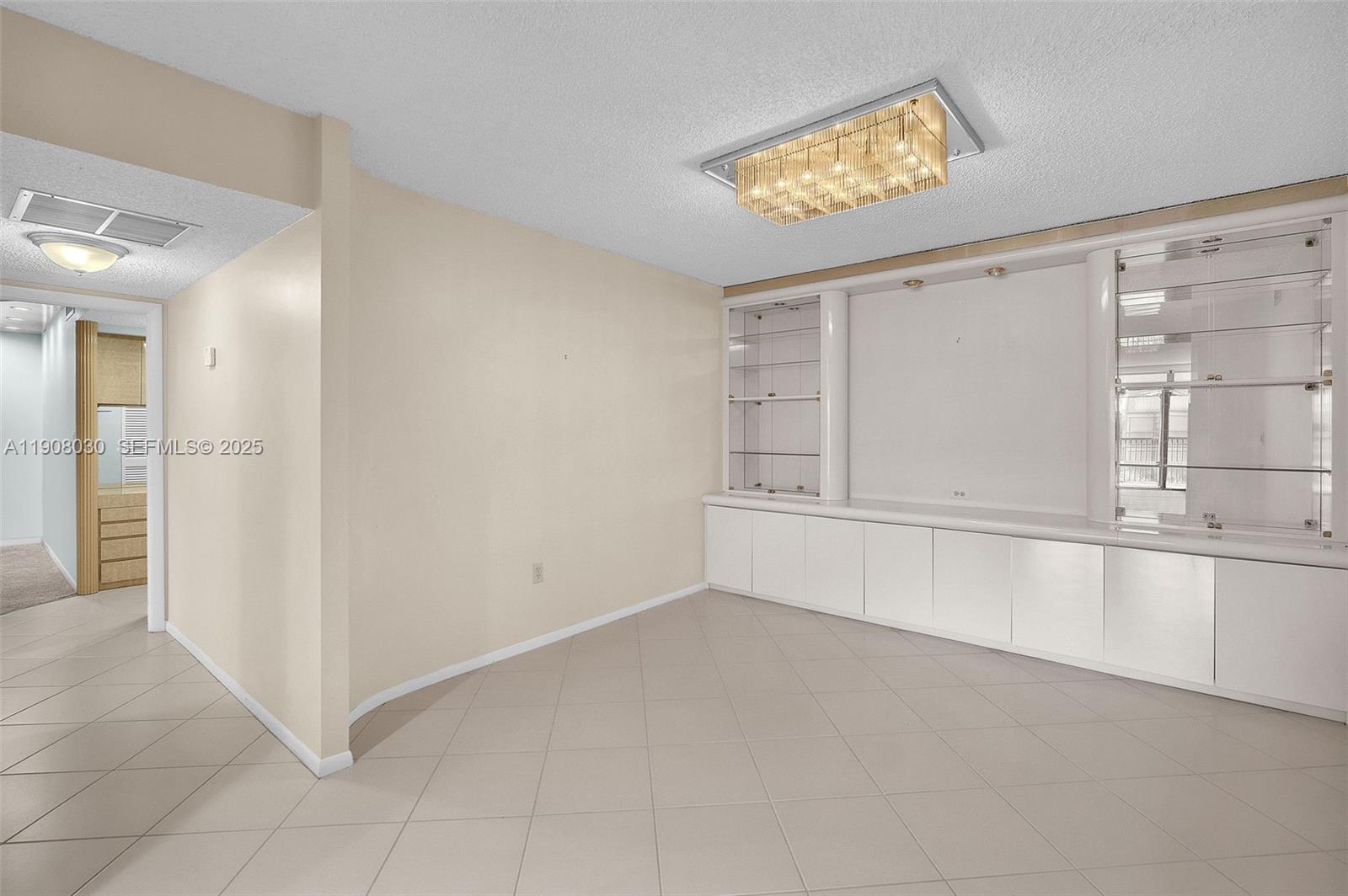 2810 North 46th Avenue, Unit F655 Hollywood, FL 33021 - Photo 23 of 52 a view of an empty room
