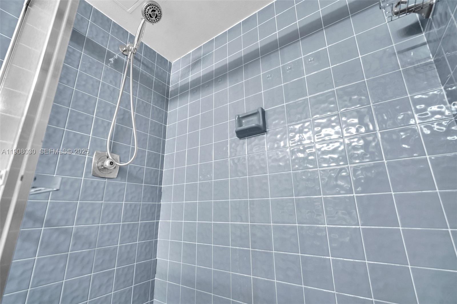 2810 North 46th Avenue, Unit F655 Hollywood, FL 33021 - Photo 34 of 52 a bathroom with a shower