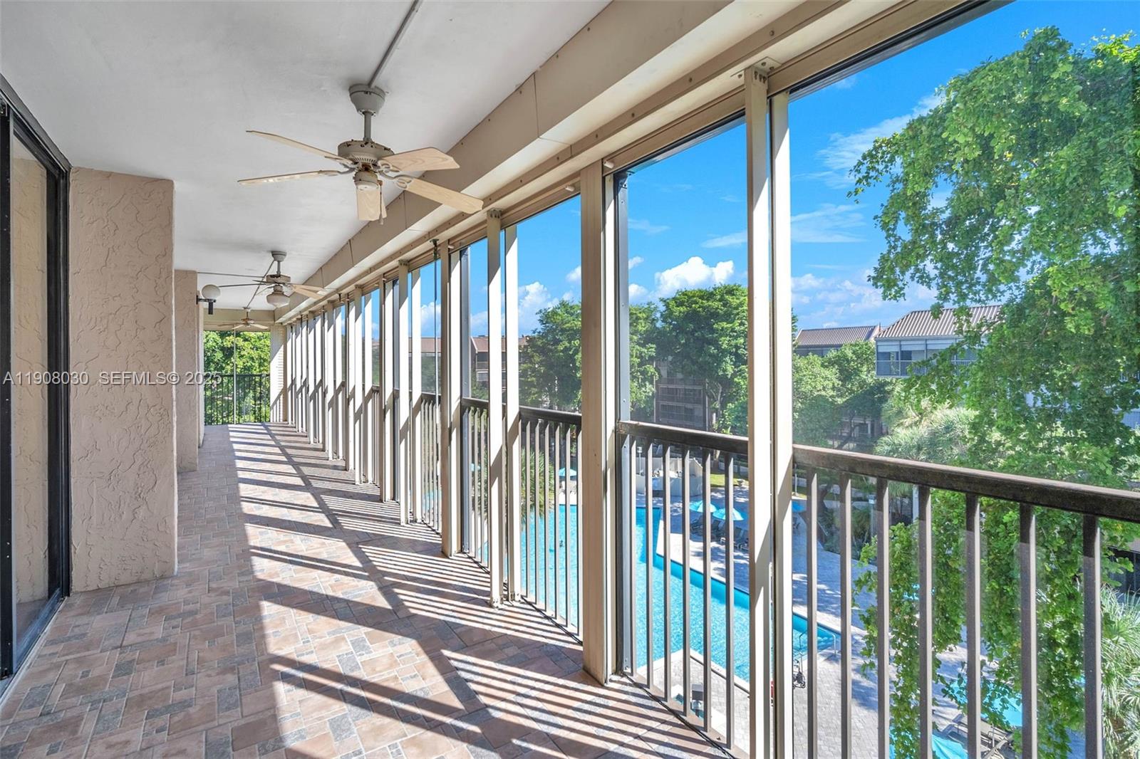 2810 North 46th Avenue, Unit F655 Hollywood, FL 33021 - Photo 50 of 52 a view of a balcony with wooden floor