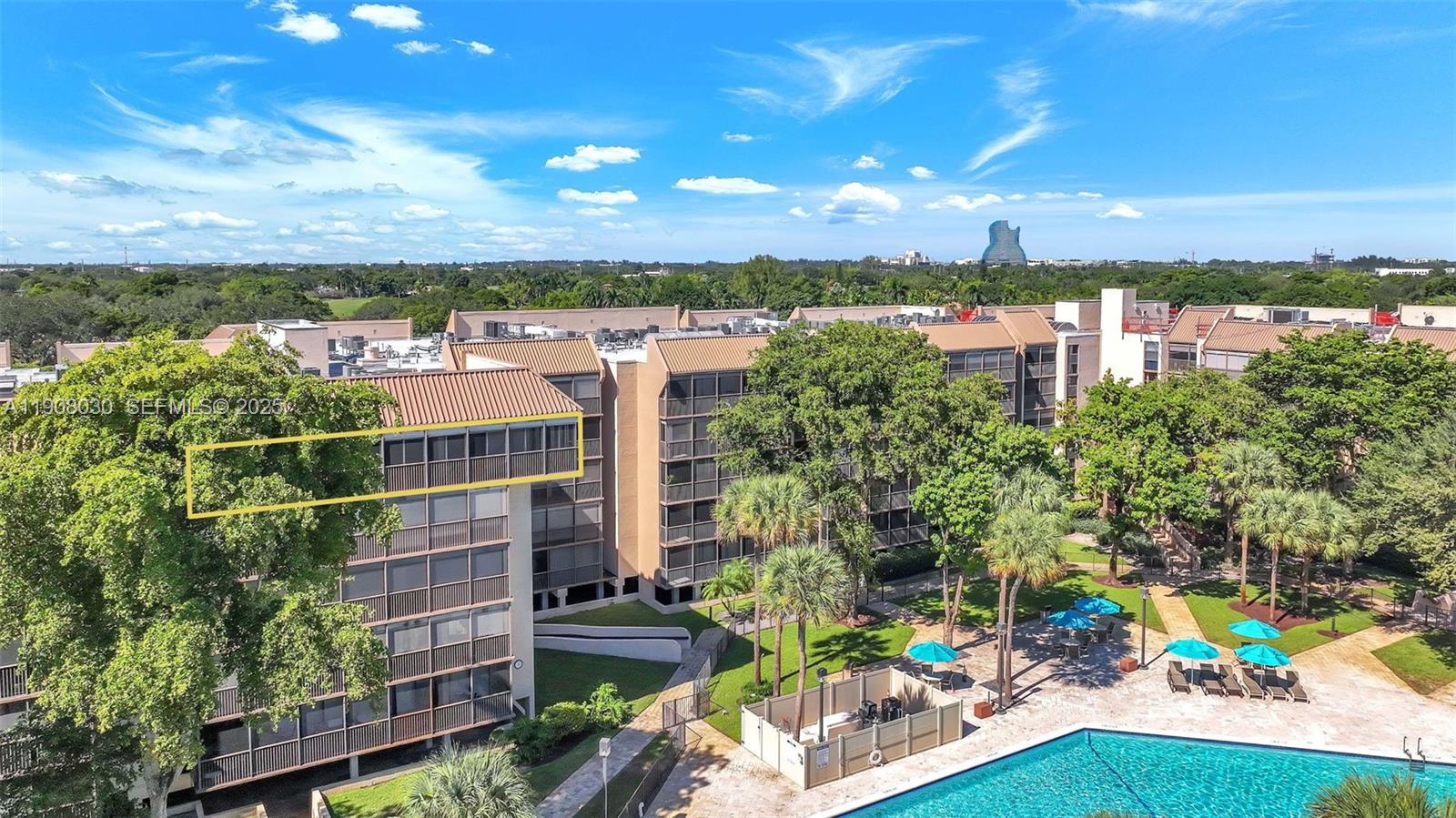 2810 North 46th Avenue, Unit F655 Hollywood, FL 33021 - Photo 7 of 52 a view of a lake with a building in the background