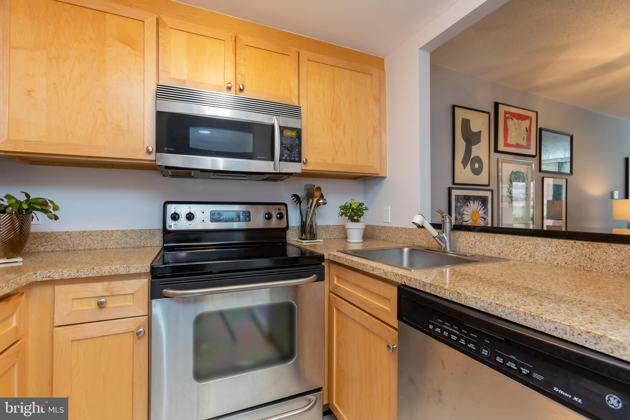 1150 K Street Northwest, Unit 706 Washington, DC 20005 - Photo 9 of 15 Kitchen with stainless appliances