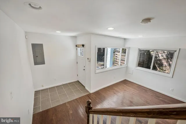 a view of an empty room and window