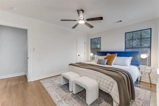 a view of a backyard with large trees