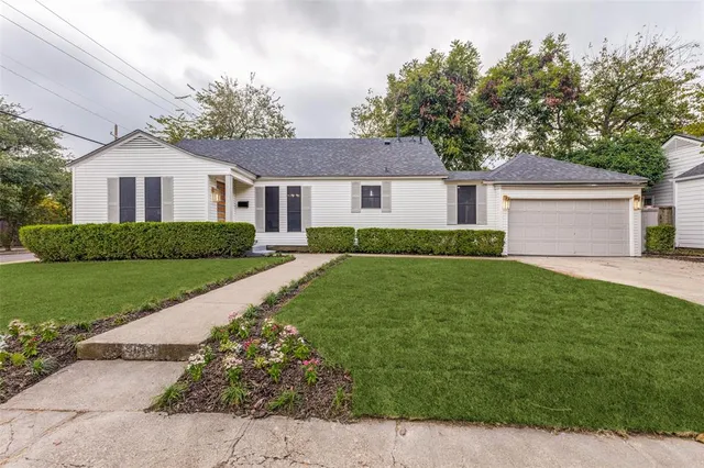 front view of a house and a yard