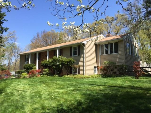 237 Russet Road Stamford, CT 06903 - Photo 1 of 1 a front view of house with a garden