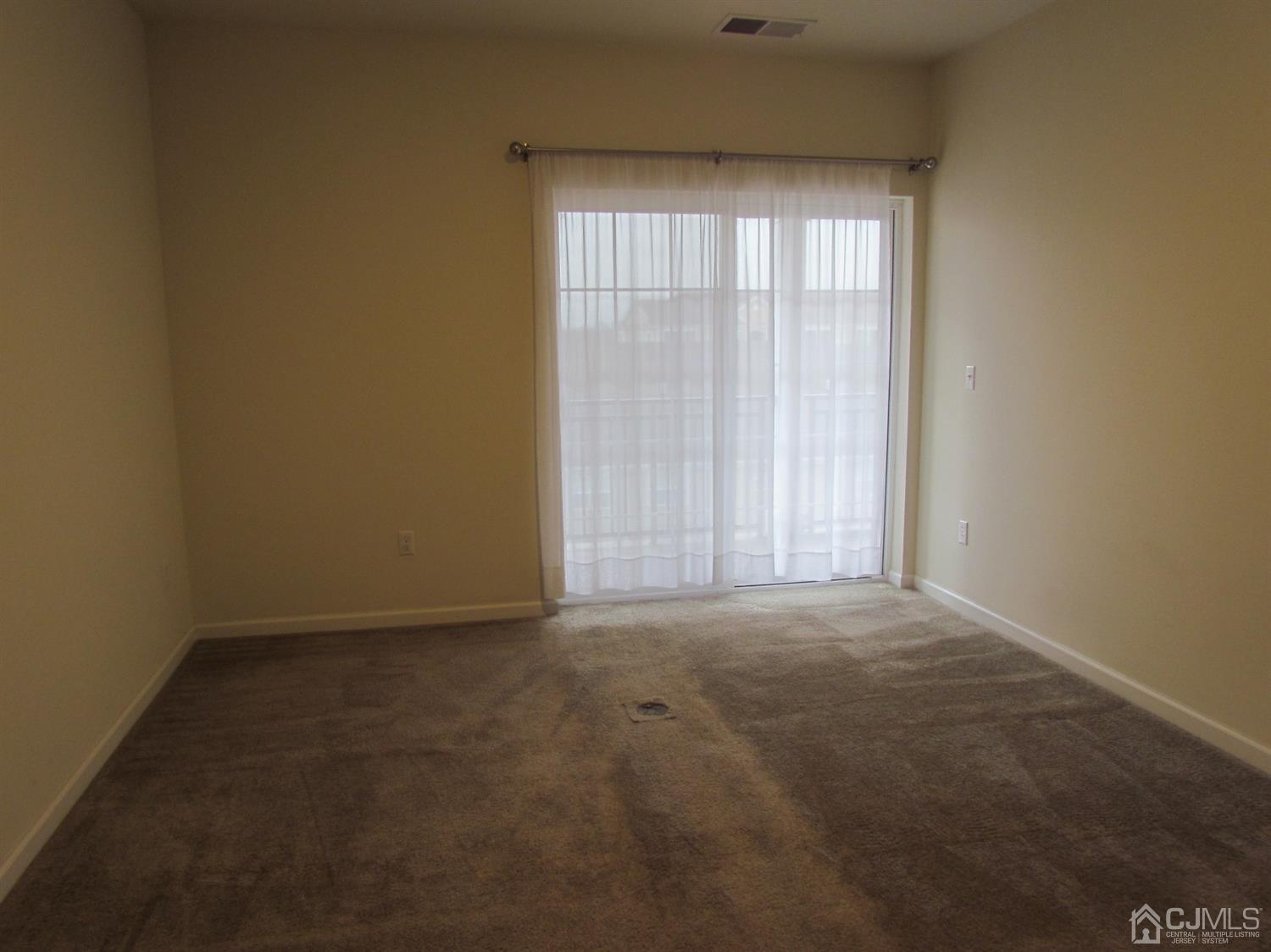 746 Strassle Way South Plainfield, NJ 07080 - Photo 11 of 25 an empty room with a window