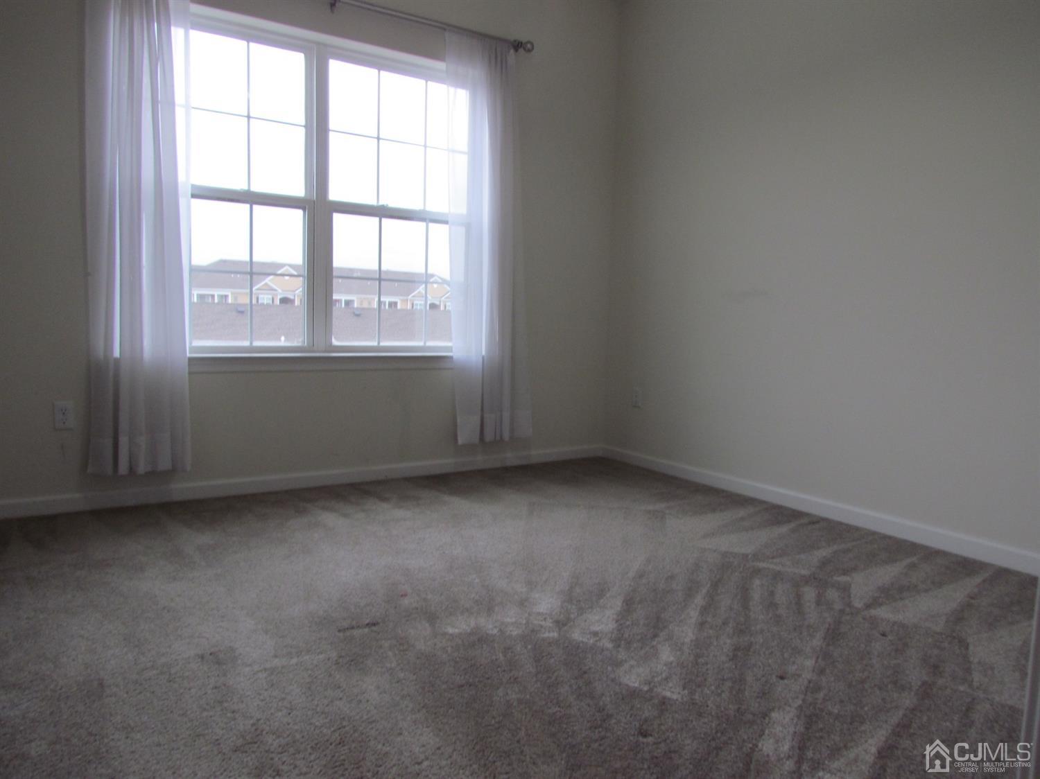 746 Strassle Way South Plainfield, NJ 07080 - Photo 17 of 25 an empty room with a window