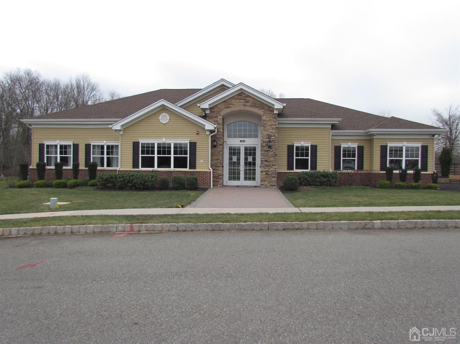 746 Strassle Way South Plainfield, NJ 07080 - Photo 23 of 25 a front view of a house with a garden