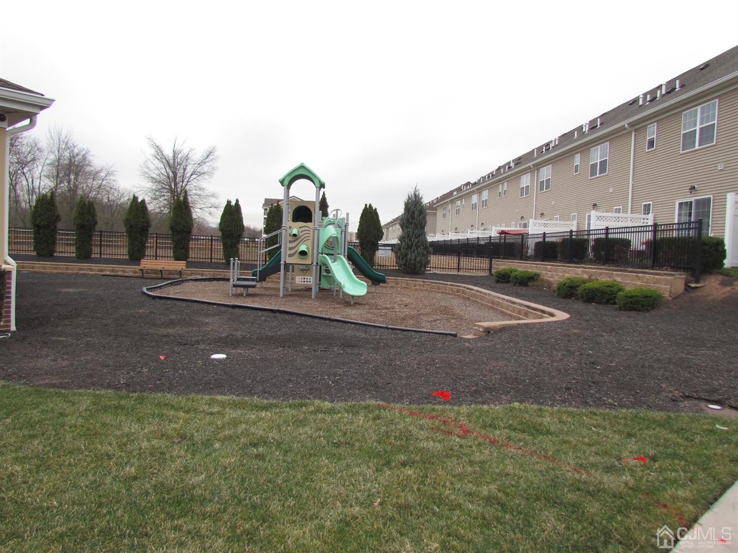 746 Strassle Way South Plainfield, NJ 07080 - Photo 24 of 25 a backyard of a house with table and chairs
