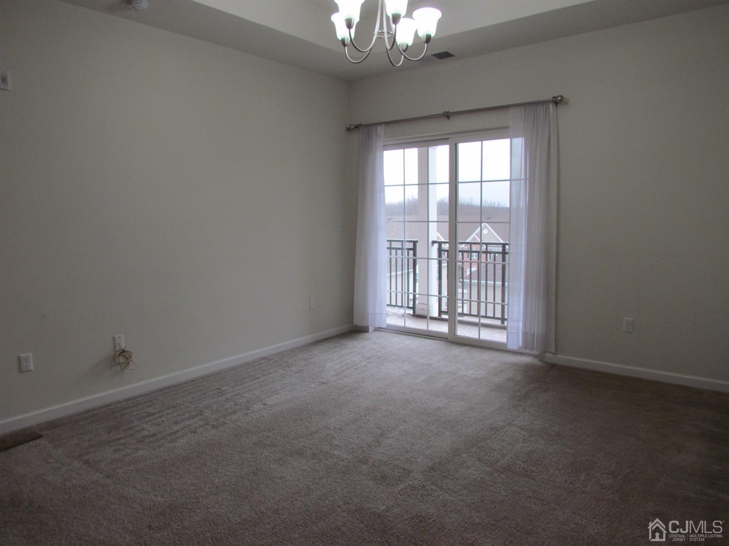 746 Strassle Way South Plainfield, NJ 07080 - Photo 4 of 25 a view of an empty room with a window