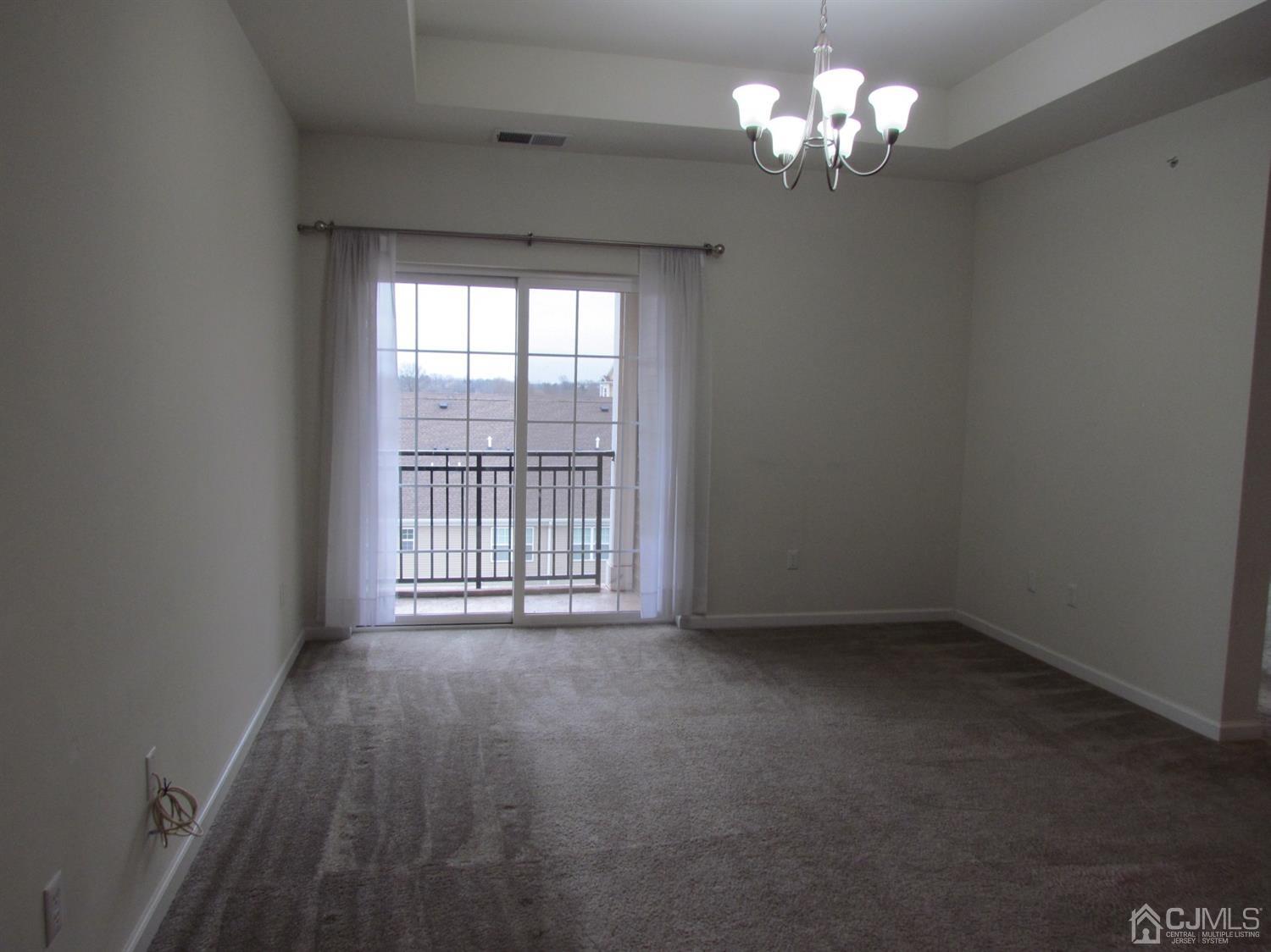 746 Strassle Way South Plainfield, NJ 07080 - Photo 5 of 25 a view of an empty room with a window