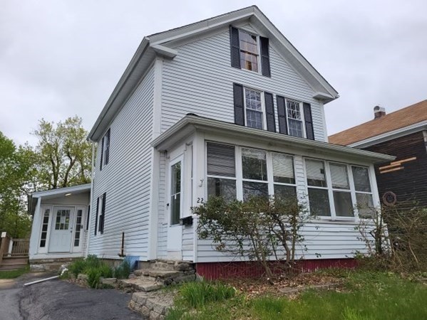 22 Pine Street Leicester, MA 01524 - Photo 1 of 13 front view of a house with a yard