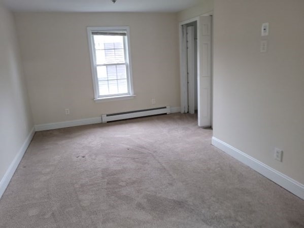 22 Pine Street Leicester, MA 01524 - Photo 13 of 13 an empty room with windows