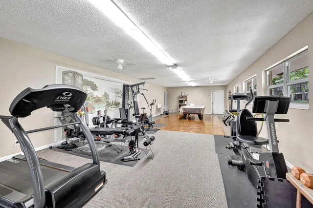 a view of a room with gym equipment