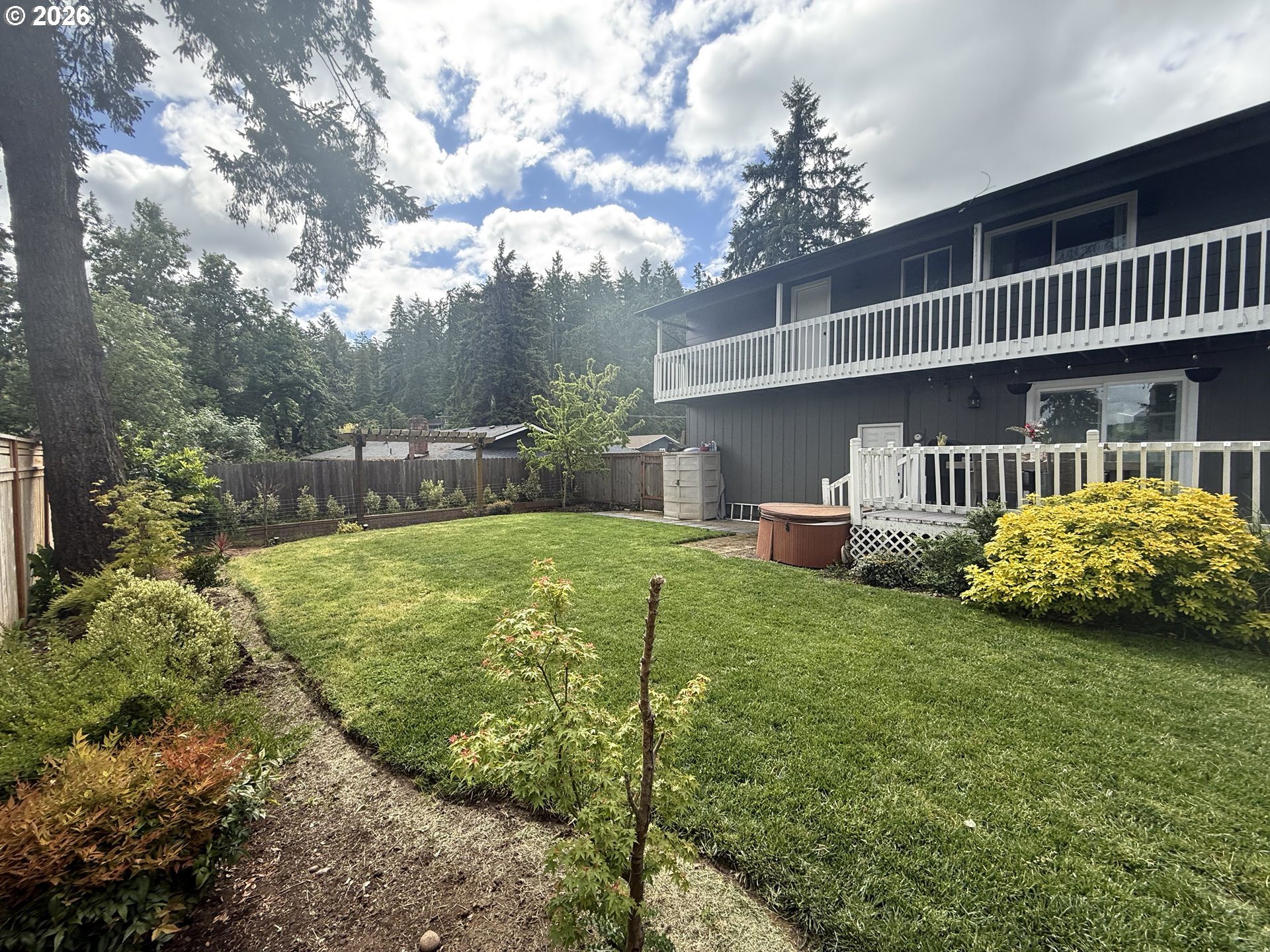 6974 Glacier Drive Springfield, OR 97478 - Photo 29 of 37 a view of a house with backyard and porch