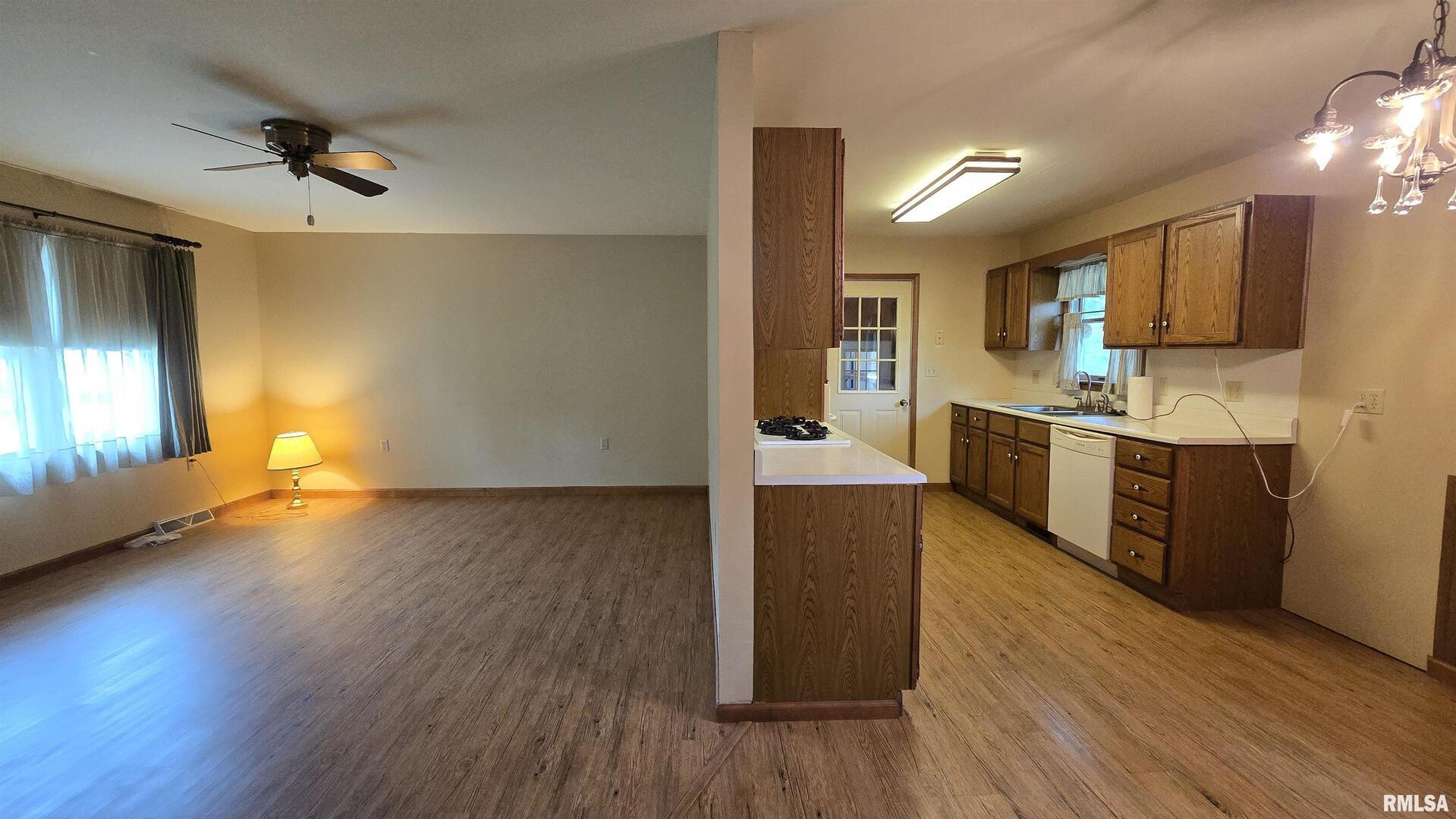 400 Old Broughton Road Eldorado, IL 62930 - Photo 17 of 28 a view of kitchen with cabinets and wooden floor
