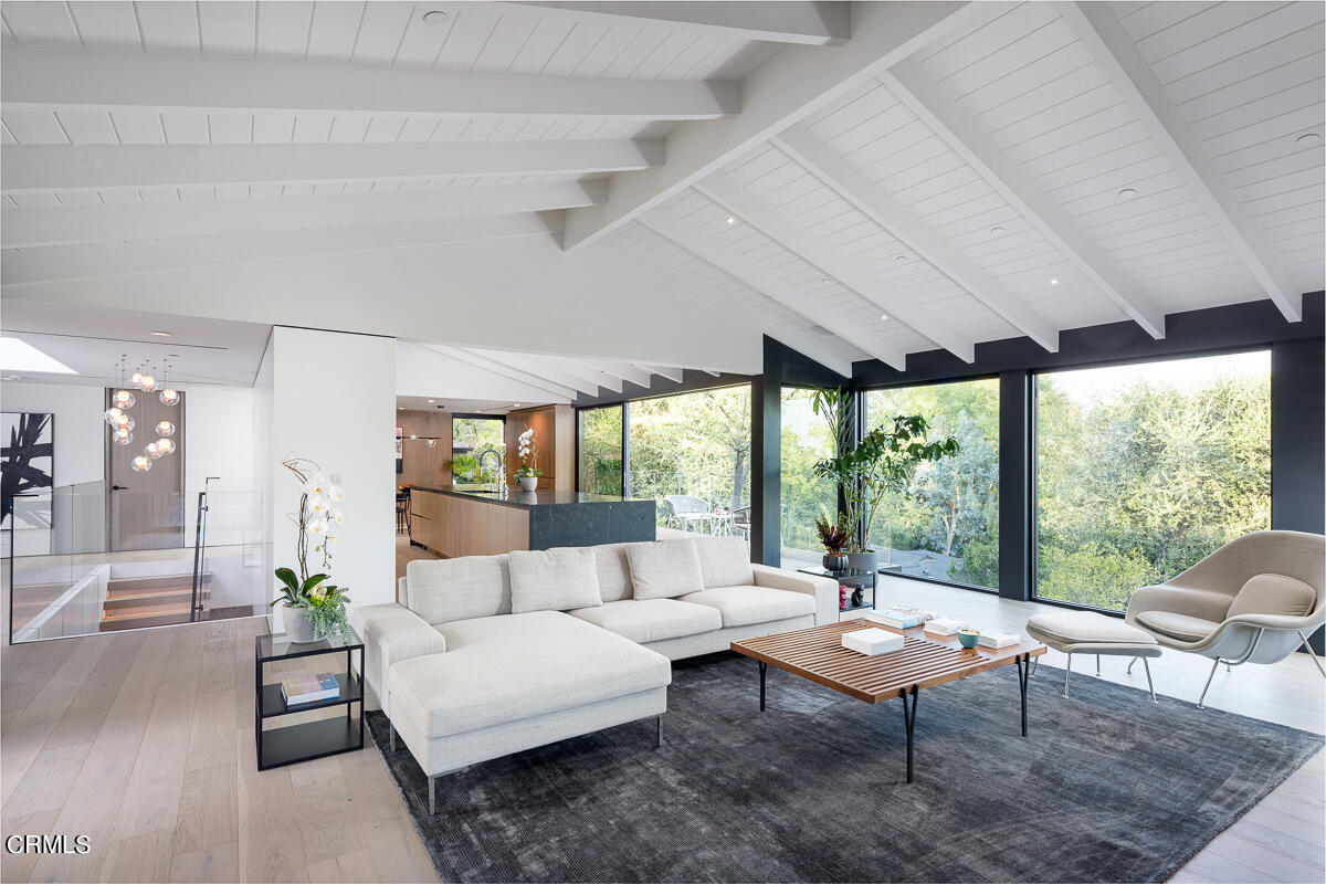 Undisclosed Address Pasadena, CA 91103 - Photo 20 of 74 a living room with furniture a table and a large window