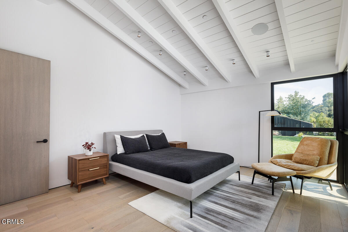 Undisclosed Address Pasadena, CA 91103 - Photo 32 of 74 a living room with furniture and a floor to ceiling window