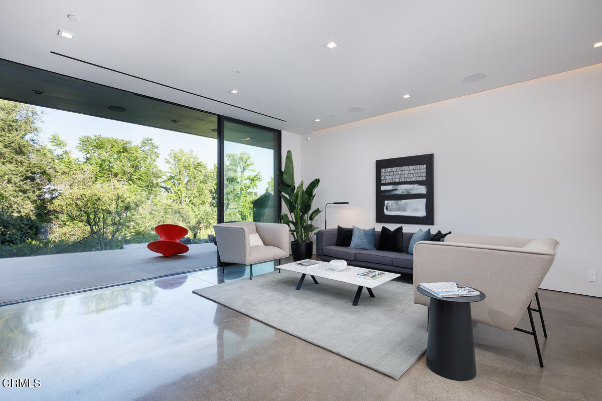 Undisclosed Address Pasadena, CA 91103 - Photo 35 of 74 a living room with furniture and a large window