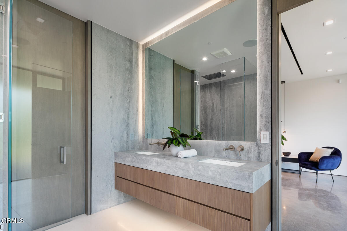 Undisclosed Address Pasadena, CA 91103 - Photo 38 of 74 a bathroom with a granite countertop sink a toilet and a mirror