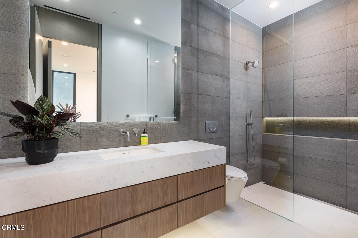 Undisclosed Address Pasadena, CA 91103 - Photo 42 of 74 a bathroom with a sink a toilet and shower