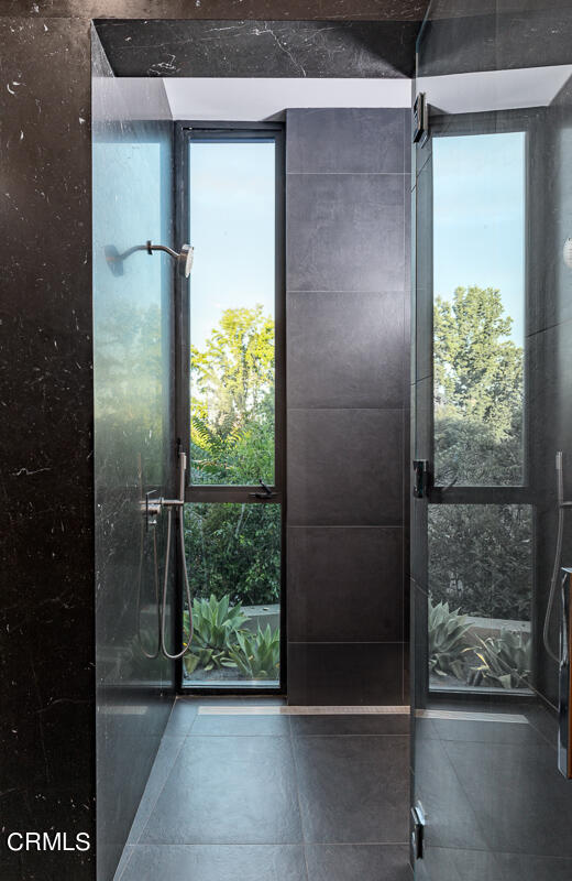 Undisclosed Address Pasadena, CA 91103 - Photo 53 of 74 a bathroom with a glass shower door